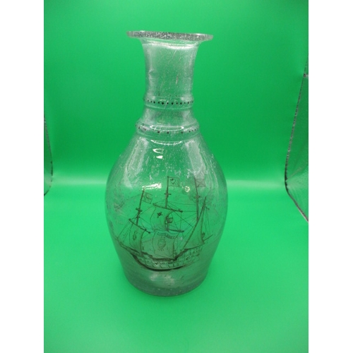 277 - A hand blow wine carafe with engraved decoration of the Santa Maria dated 1492, age related marks bu... 