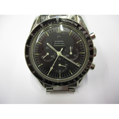 113 - A 1967 Omega Speedmaster professional watch, runs when wound but not tested as to full function, in ...