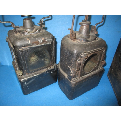 324 - Three antique railway hand lamps, all with burners, various railway company’s,  all in used conditio... 