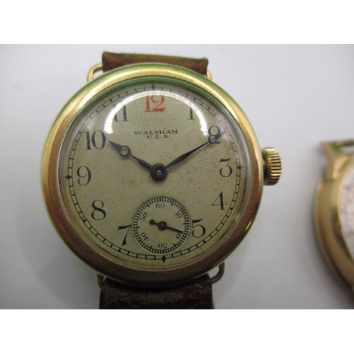 119 - A vintage 18ct gold cased Waltham wrist watch, runs when wound and another gold cased example in nee... 