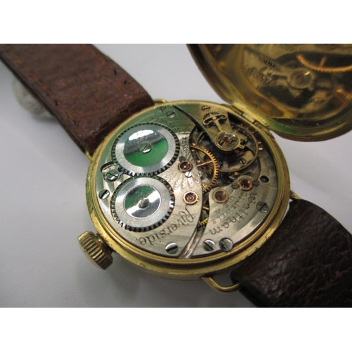 119 - A vintage 18ct gold cased Waltham wrist watch, runs when wound and another gold cased example in nee... 