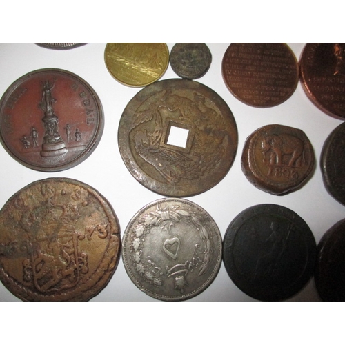 256 - A parcel of antique and later world coins, tokens and medallions, to include silver hammered example... 