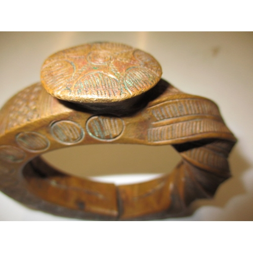 181 - An antique West African Manillas trading bangle coin, a large size version approx. weight 685g, havi... 