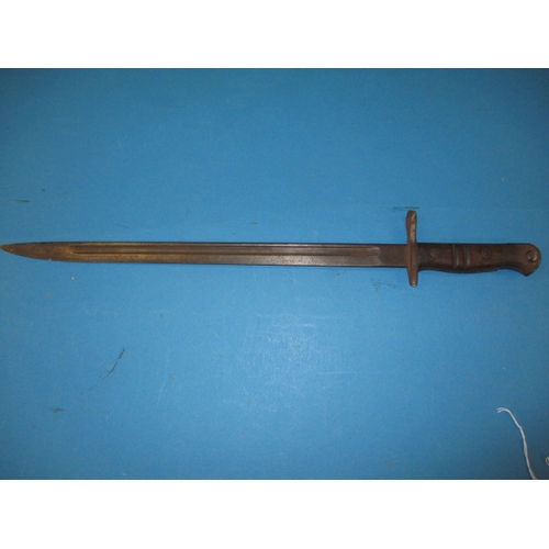 313 - A WWI bayonet, dated to hilt, in well used condition, approx. length 54cm