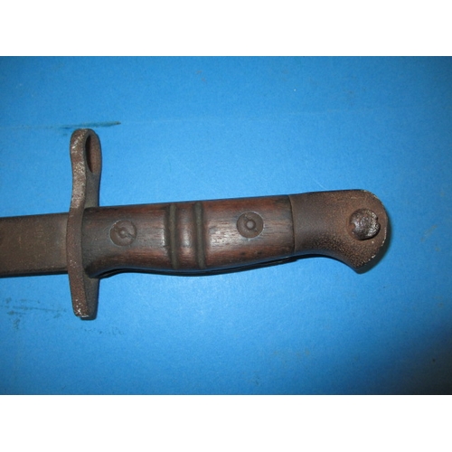 313 - A WWI bayonet, dated to hilt, in well used condition, approx. length 54cm