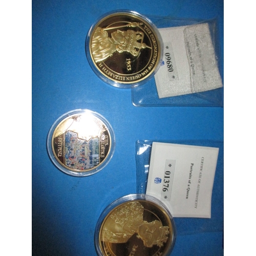 258 - A parcel of Westminster Mint collectors coins, and Danbury Mint coin covers, to include a gold plate... 