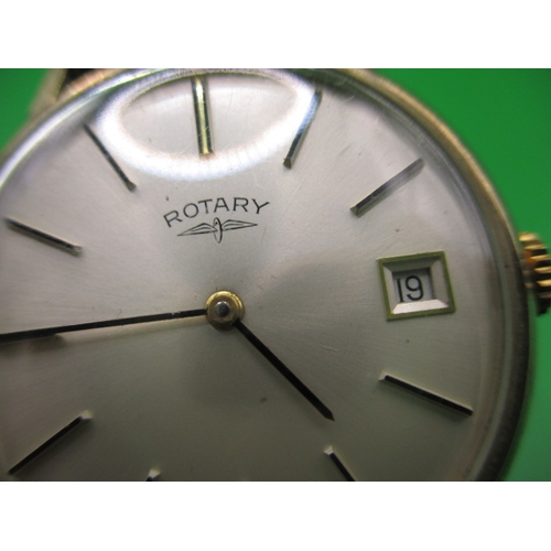 99 - A vintage gents 9ct gold Rotary wrist watch with date window, having general use-related marks and n... 