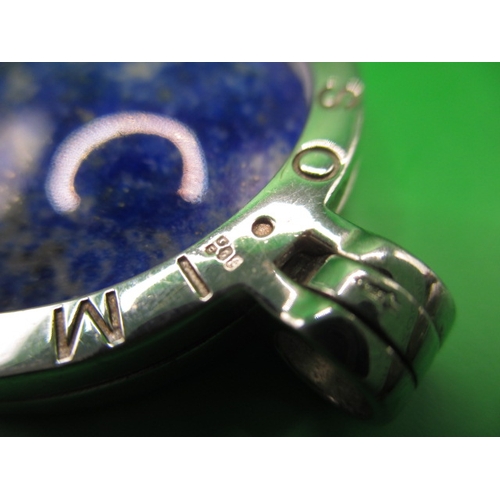 134 - Two sterling silver and lapis lazuli necklace pendants, both in good useable pre-owned condition