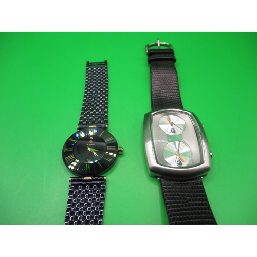 127 - A H Stern sapphire watch and a dual dial quartz example, both in used condition and neither tested a... 