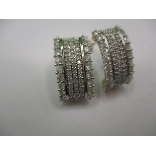 62 - A pair of 9ct gold and diamond earrings, in good pre-owned condition, approx. parcel weight 4.3g on ... 