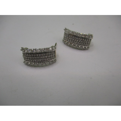 62 - A pair of 9ct gold and diamond earrings, in good pre-owned condition, approx. parcel weight 4.3g on ... 