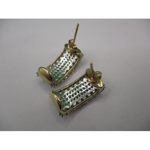 62 - A pair of 9ct gold and diamond earrings, in good pre-owned condition, approx. parcel weight 4.3g on ... 