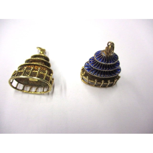 144 - A pair of gilt silver and enamel earring/pendants in the form of pagodas, in good used condition