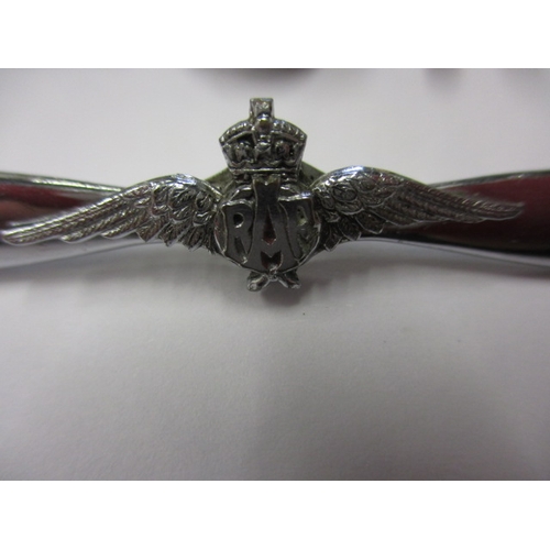 303 - Two RAF associated brooches, one marked 925, both in good useable pre-owned condition, approx. lengt... 