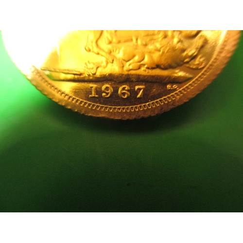 203 - A Queen Elizabeth II gold sovereign dated 1967, a very fine grade coin with light use related marks