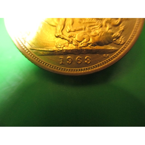 204 - A Queen Elizabeth II gold sovereign dated 1963, a fine grade coin with light use related marks