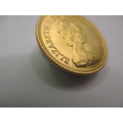 213 - A Queen Elizabeth II gold half sovereign dated 1982, a very fine grade coin with light use related m... 