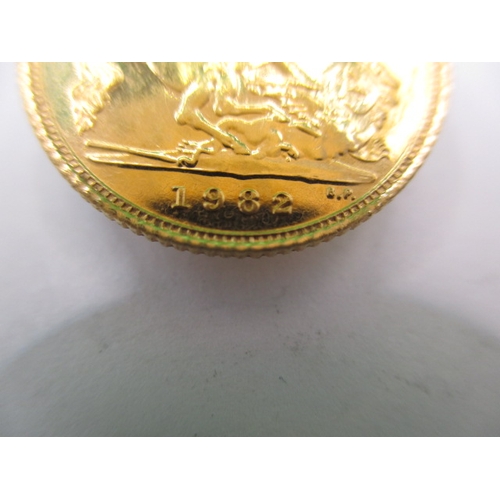 213 - A Queen Elizabeth II gold half sovereign dated 1982, a very fine grade coin with light use related m... 