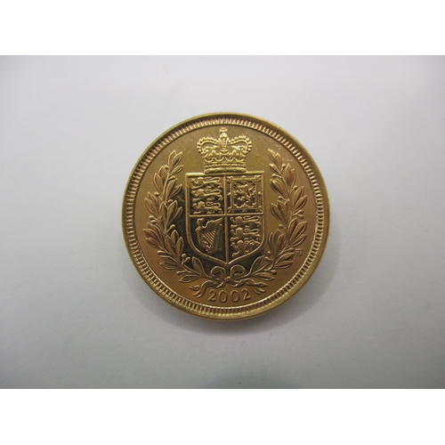 214 - A Queen Elizabeth II gold half sovereign dated 2002, a very fine grade coin with light use related m... 