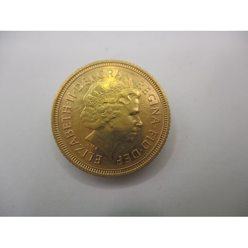 215 - A Queen Elizabeth II gold half sovereign dated 2001, a very fine grade coin with light use related m... 