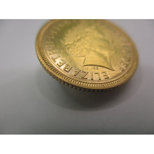 215 - A Queen Elizabeth II gold half sovereign dated 2001, a very fine grade coin with light use related m... 