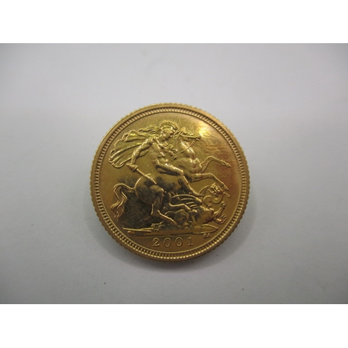 215 - A Queen Elizabeth II gold half sovereign dated 2001, a very fine grade coin with light use related m... 