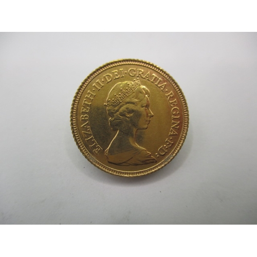 216 - A Queen Elizabeth II gold half sovereign dated 1982, a very fine grade coin with light use related m... 