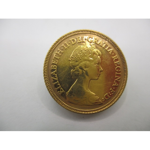 218 - A Queen Elizabeth II gold half sovereign dated 1982, a very fine grade coin with light use related m... 