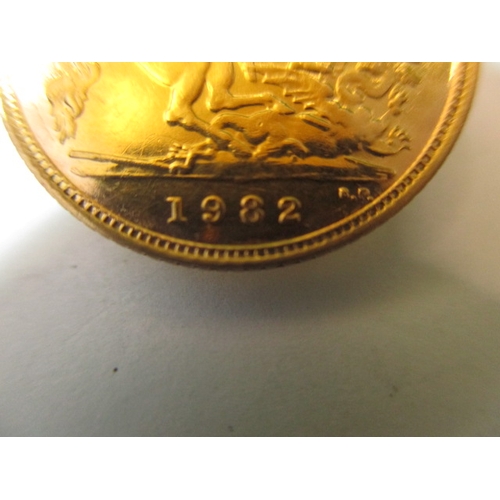 218 - A Queen Elizabeth II gold half sovereign dated 1982, a very fine grade coin with light use related m... 