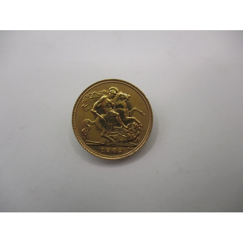 219 - A Queen Elizabeth II gold half sovereign dated 1982, a very fine grade coin with light use related m... 