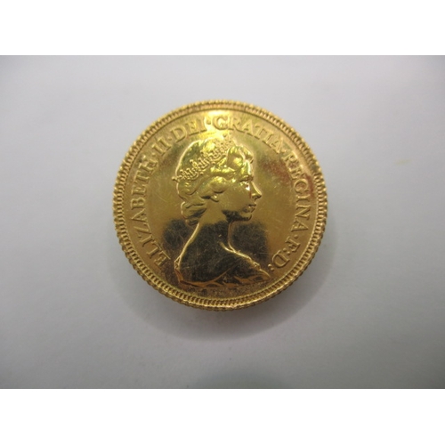 220 - A Queen Elizabeth II gold half sovereign dated 1982, a very fine grade coin with light use related m... 