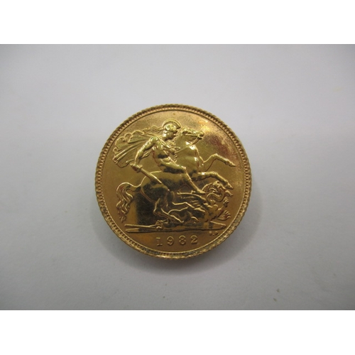 220 - A Queen Elizabeth II gold half sovereign dated 1982, a very fine grade coin with light use related m... 