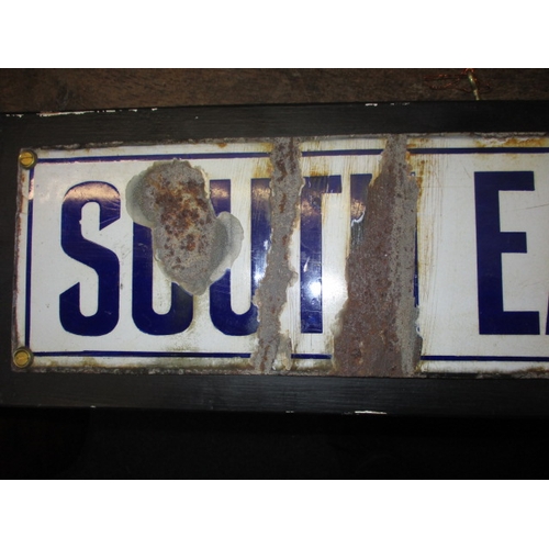 378 - A vintage enamel sign for South Eastern & Chatham Railway, approx. size 133x14.5cm, having some enam... 