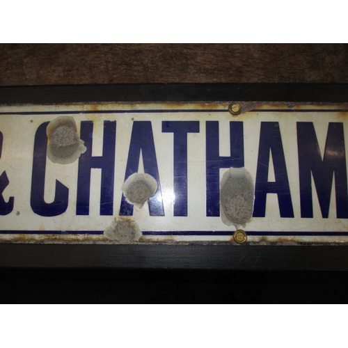 378 - A vintage enamel sign for South Eastern & Chatham Railway, approx. size 133x14.5cm, having some enam... 