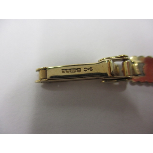 101 - A 1991 IMADO 9ct gold watch and strap, with original box and papers and in good working order, appro... 