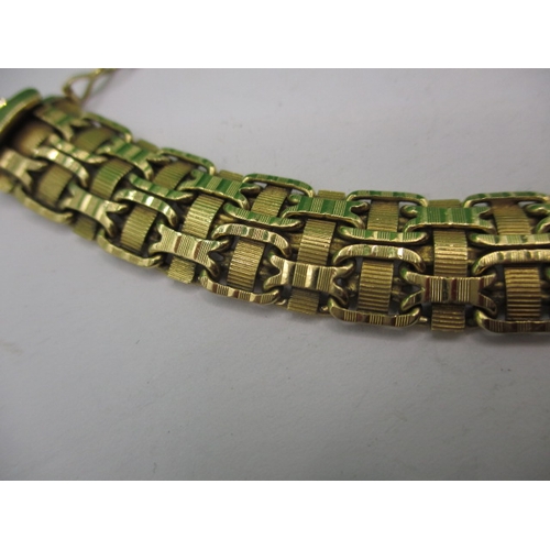 73 - A vintage 18ct yellow gold bracelet, approx. linear length 20cm, approx. weight 32.1g in useable pre... 