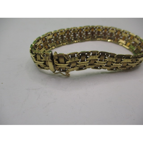 73 - A vintage 18ct yellow gold bracelet, approx. linear length 20cm, approx. weight 32.1g in useable pre... 