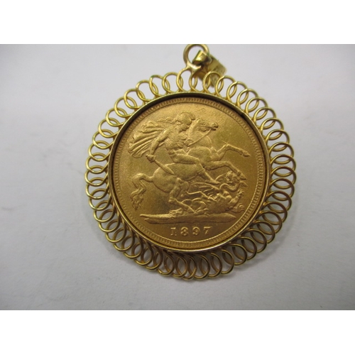 74 - A vintage necklace pendant, marked 18k with copy sovereign dated 1897, approx. gross weight 6.5g in ... 