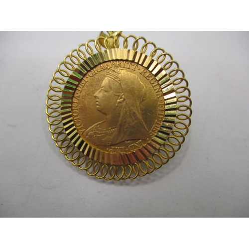 74 - A vintage necklace pendant, marked 18k with copy sovereign dated 1897, approx. gross weight 6.5g in ... 