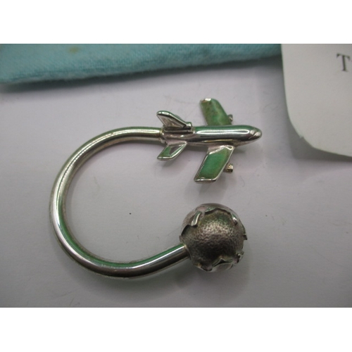 147 - A genuine Tiffany & Co silver key ring with original bag and card, purchased from Tiffany store in N... 