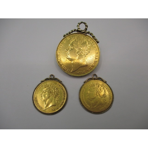 228 - A George IIII 1823 gold double sovereign and two half sovereigns dated 1825, having mounts soldered ... 