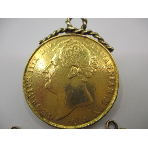 228 - A George IIII 1823 gold double sovereign and two half sovereigns dated 1825, having mounts soldered ... 