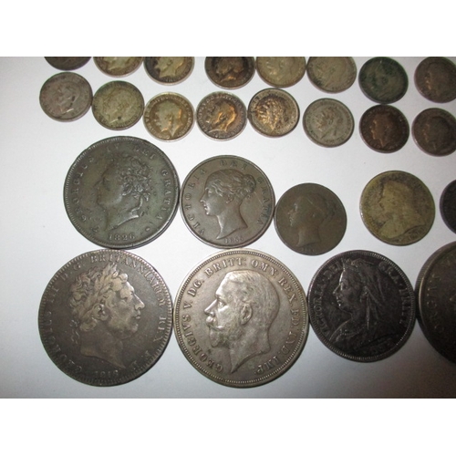 174 - A parcel of pre-decimal coins, most silver or part silver, all in circulated condition, various deno... 