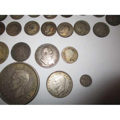 174 - A parcel of pre-decimal coins, most silver or part silver, all in circulated condition, various deno... 