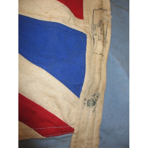 315 - A 1940 RAF ensign flag and a kit bag, battle of Britain date, with Air ministry marks, both in well ... 