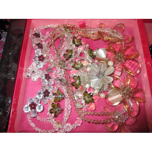 137 - A large quantity of costume jewellery, to include examples by Butler & Wilson, all in good pre-owned... 