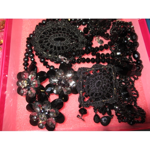 137 - A large quantity of costume jewellery, to include examples by Butler & Wilson, all in good pre-owned... 