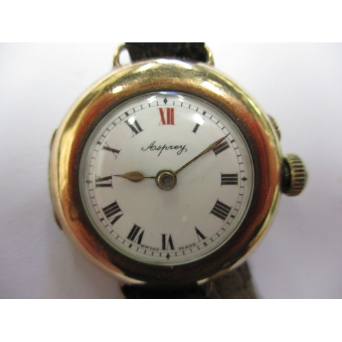 106 - A 1920s 9ct gold Asprey ladies wrist watch, in current working order, having general use-related mar... 