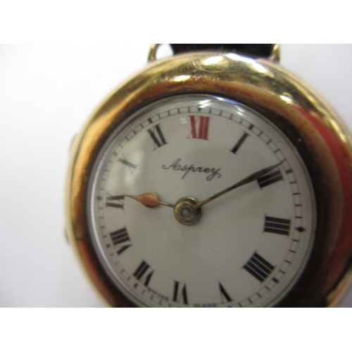 106 - A 1920s 9ct gold Asprey ladies wrist watch, in current working order, having general use-related mar... 