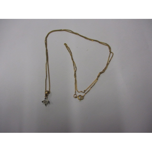 78 - A 9ct gold necklace with square cut diamond pendant, approx. linear length 42cm, approx. weight 1.2g... 